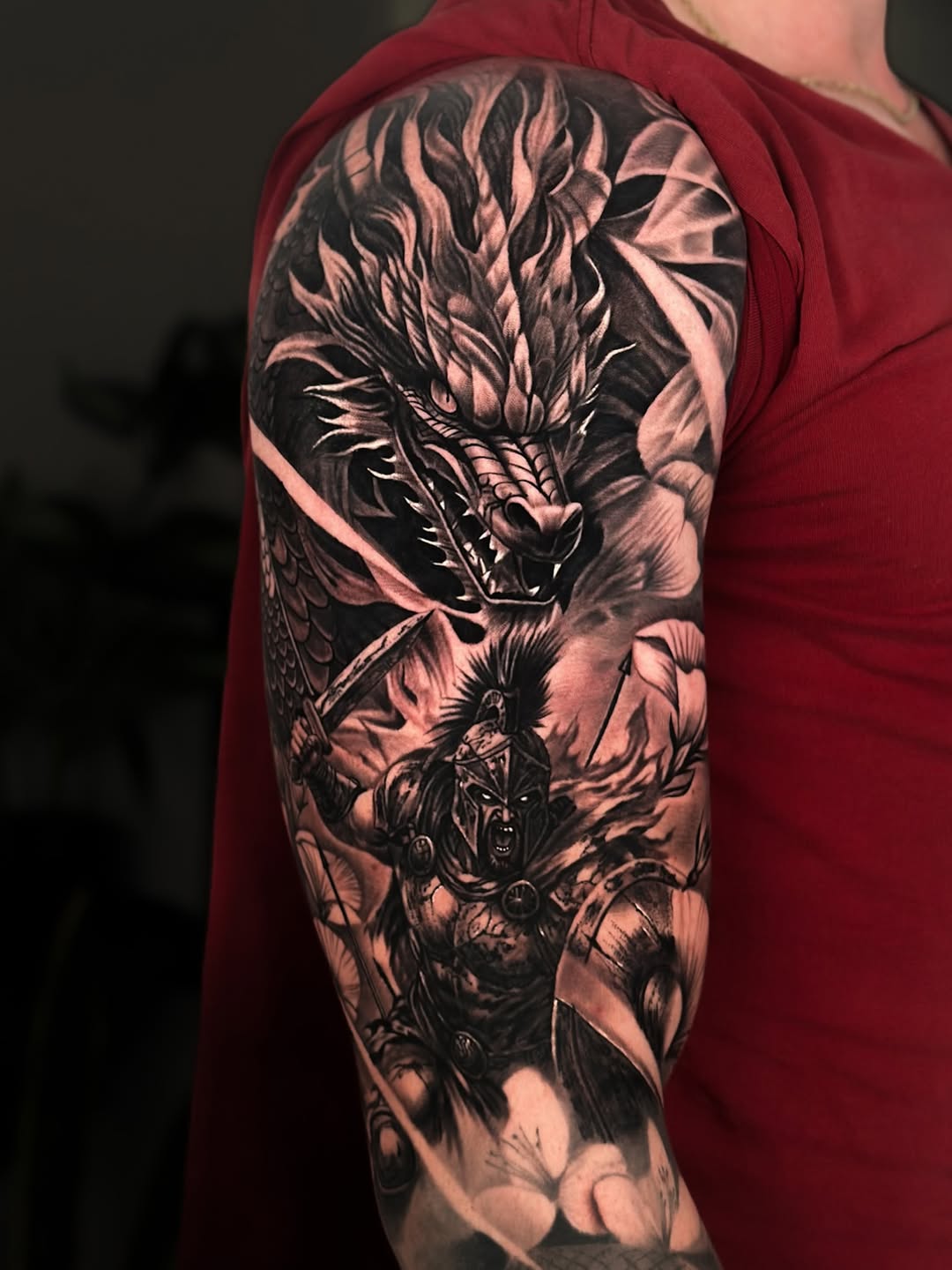 Dragon and warrior Japanese tattoo on the upper arm by Nathan, Charlotte, North Carolina