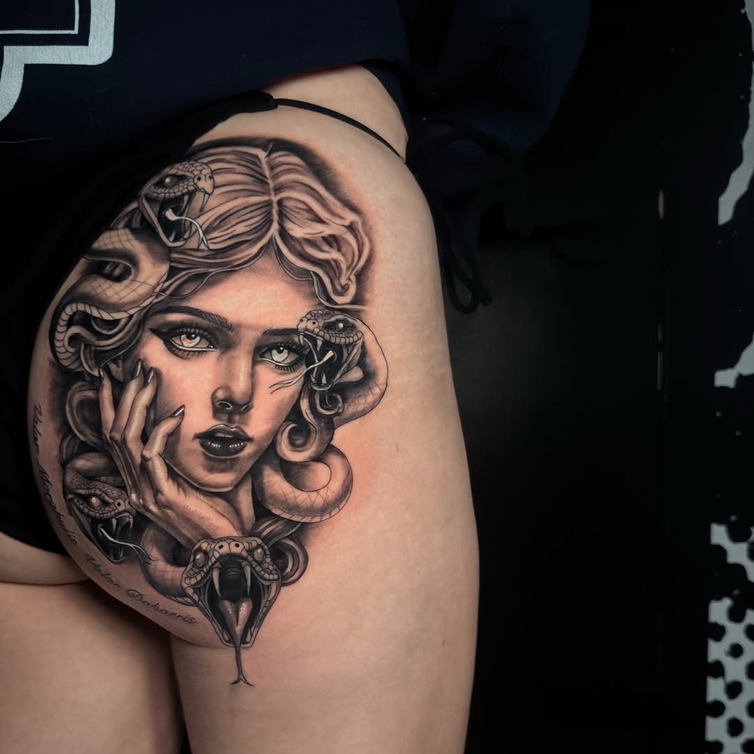 Medusa portrait with snakes realism tattoo on the thigh by Charlotte Tattoo Artist