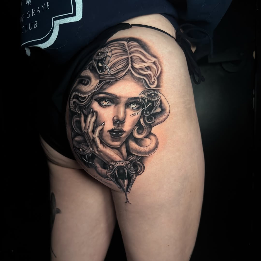 Medusa with snakes realism tattoo on the thigh by Charlotte Tattoo Artist