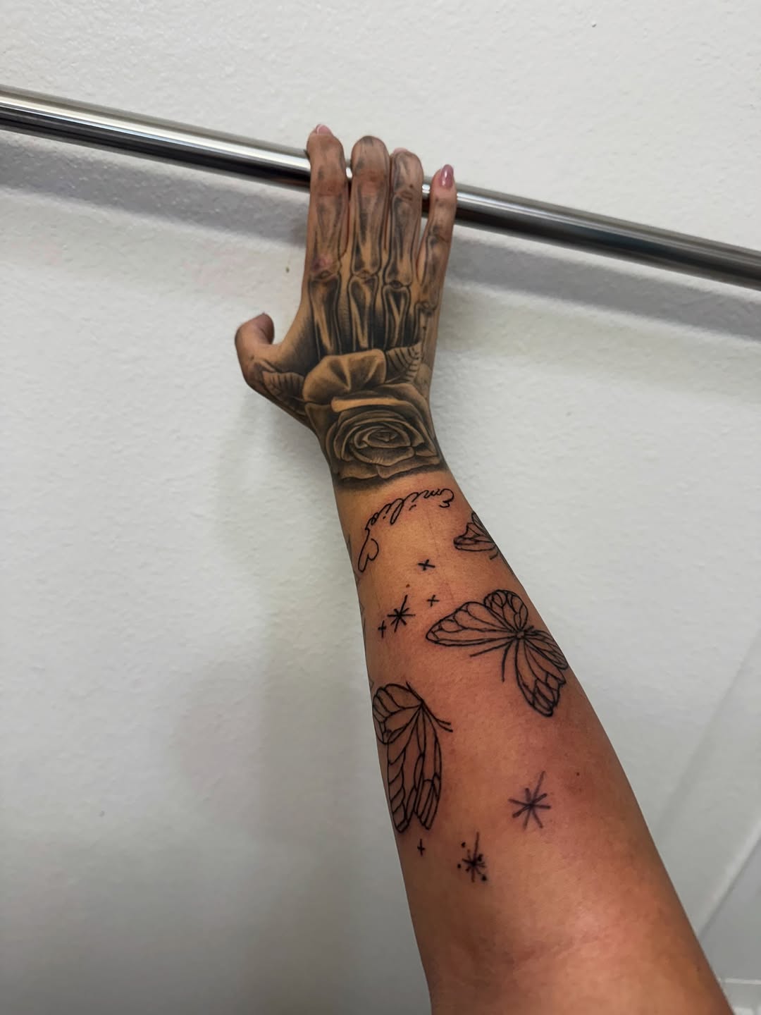 Skeleton hand rose and butterflies minimalist tattoo on the forearm by ❤️Jesselli ison ❤️