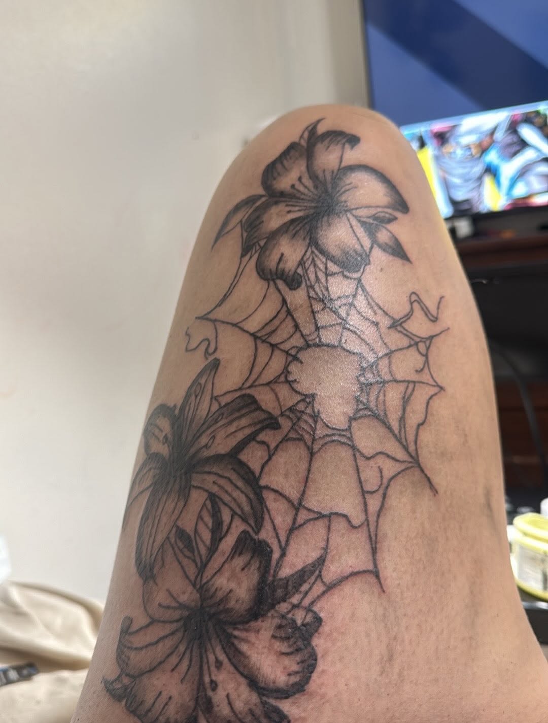Lilies and spiderweb fine line tattoo on the thigh by ❤️Jesselli ison ❤️