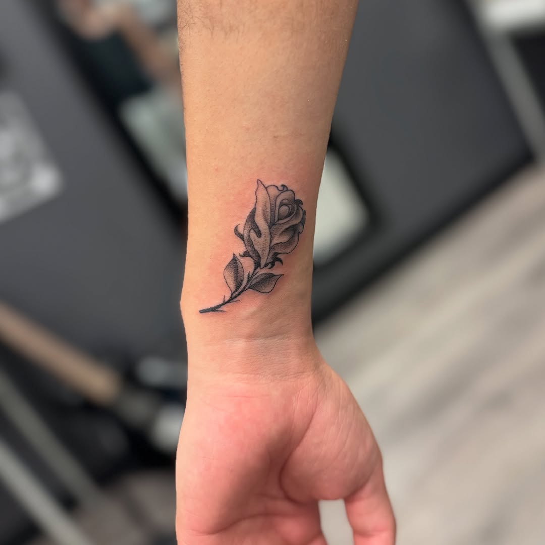 Rose dotwork tattoo on the forearm by Israel Jacob Woehler