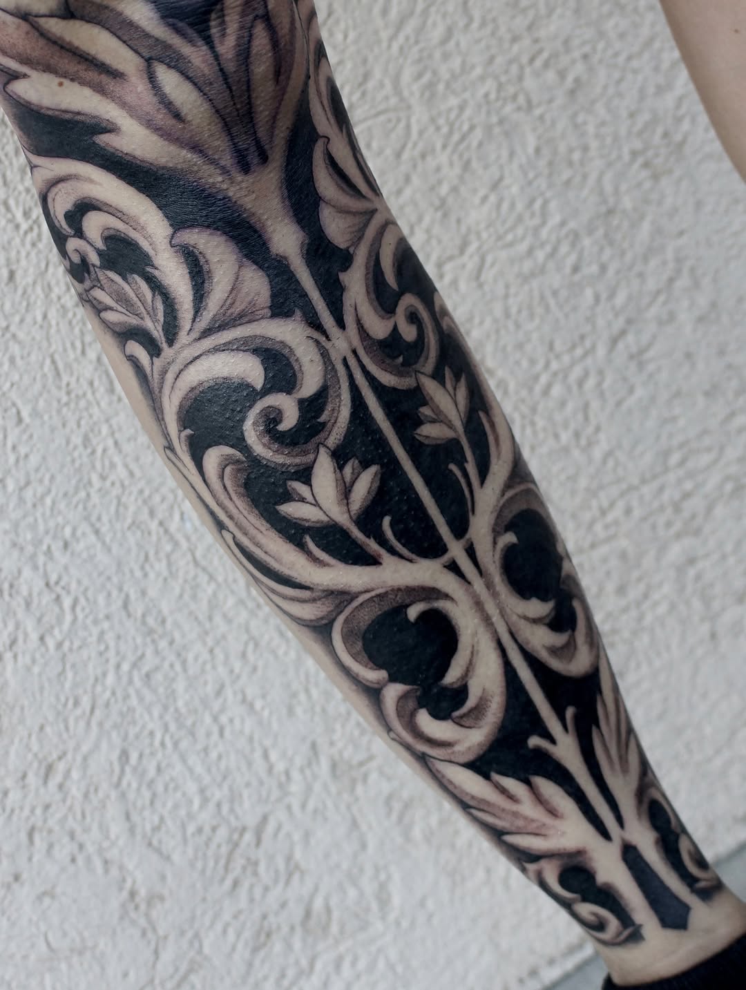 Tattoo by @bloodstonetattoos — ornamental, black_and_grey