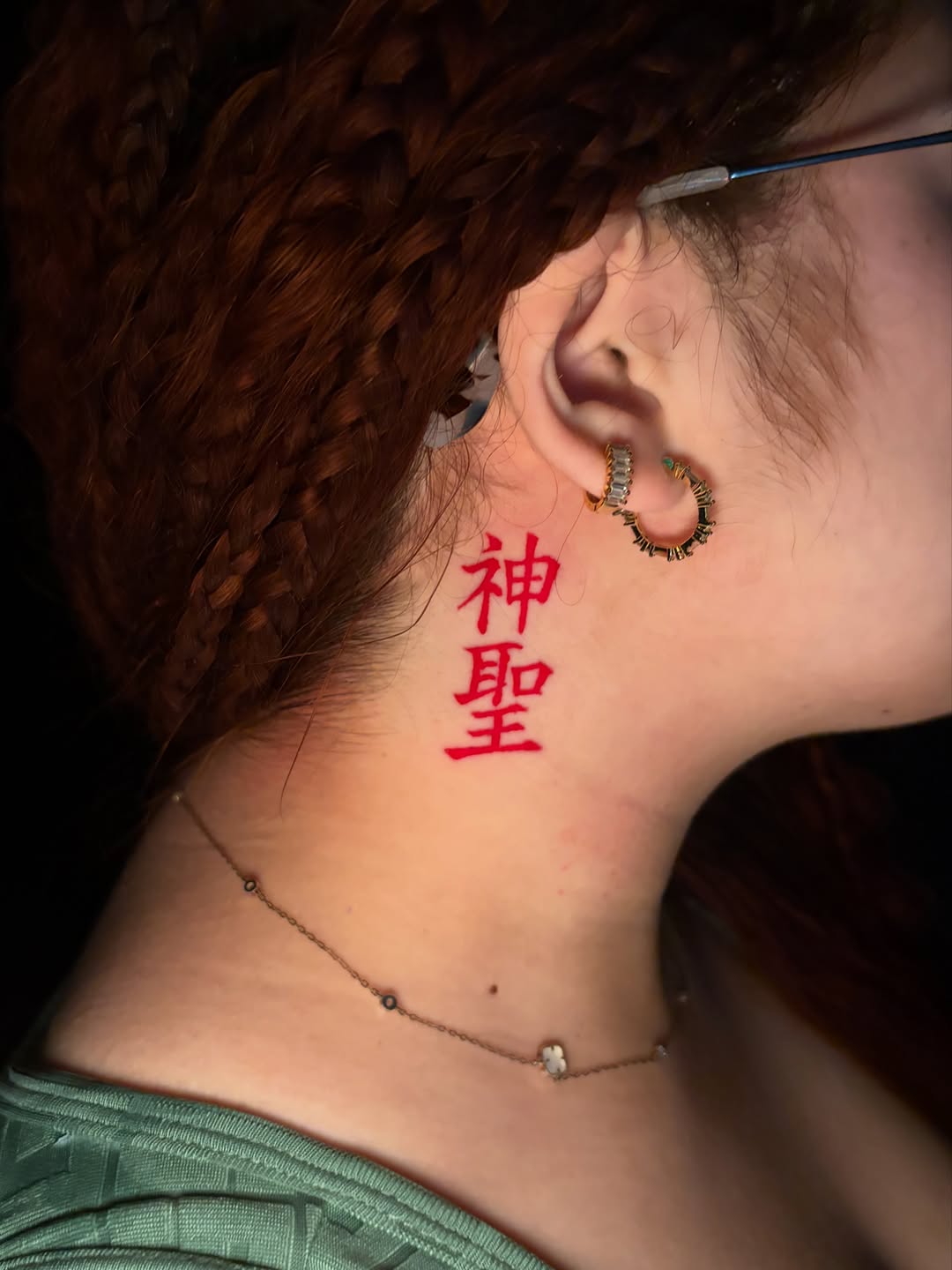 Chinese characters tattoo on the neck by @getmoneetattz