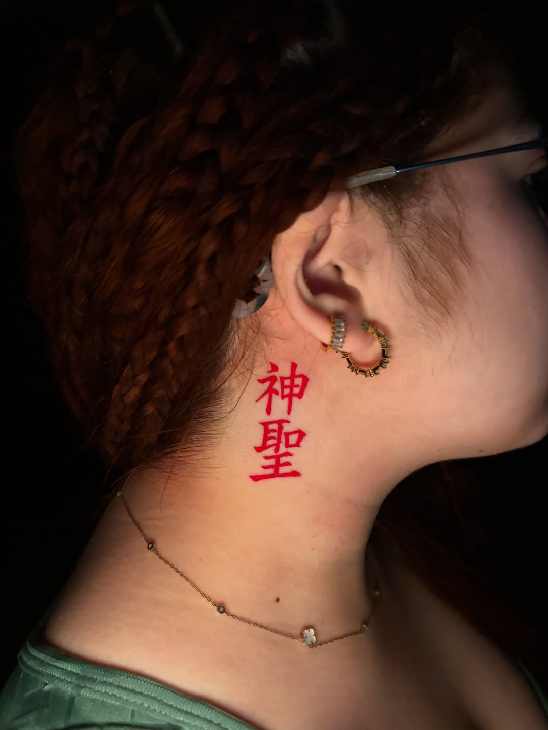 Chinese characters tattoo on the neck by @getmoneetattz