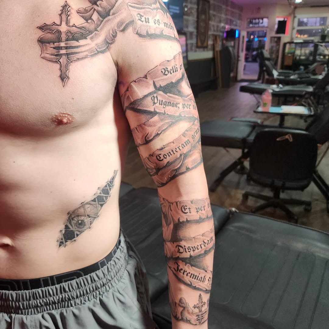 Tattoo by @j.garcia_tattooz — lettering_script, black_and_grey