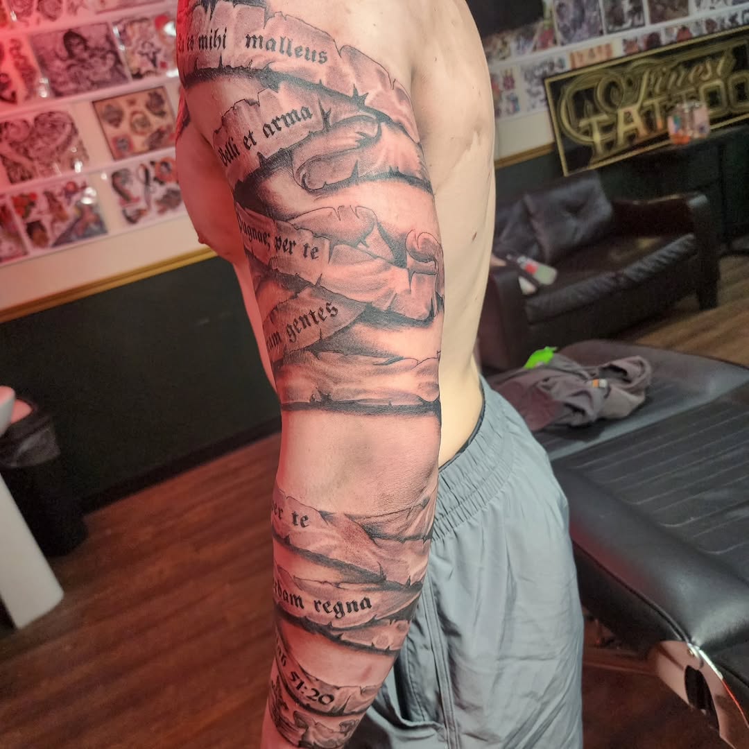 Tattoo by @j.garcia_tattooz — lettering_script, black_and_grey