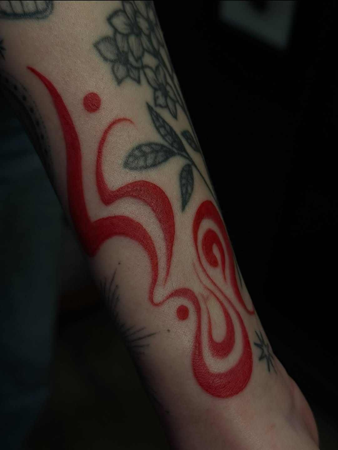 Abstract red symbol cyber sigilism tattoo on the forearm by jess jené jones, Portland, Oregon