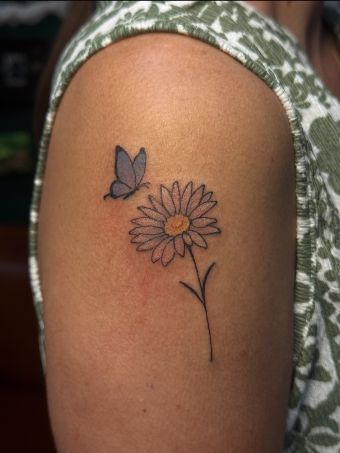 Flower and butterfly dotwork tattoo on the shoulder by jess jené jones, Portland, Oregon