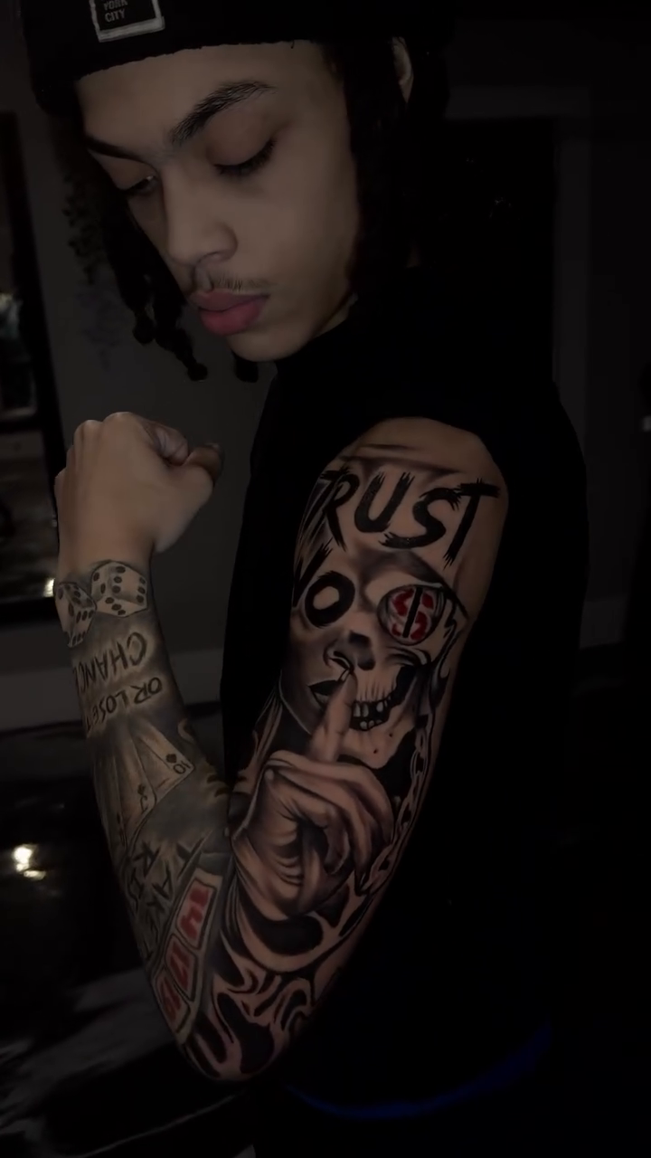 Arm sleeve with text and imagery realism tattoo on the upper arm by Tattoo Artist New York and Jersey