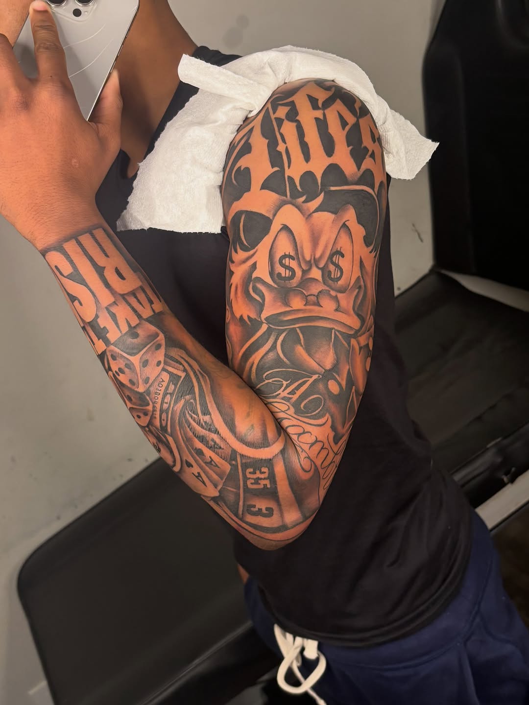 Tattoo by @10ktop_ink — black_and_grey, lettering_script