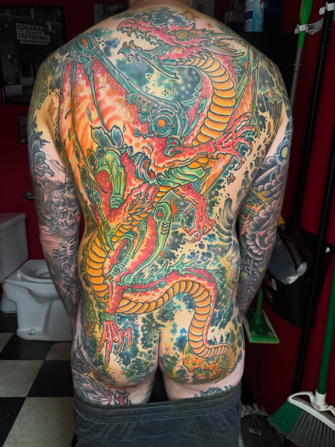 Dragon and waves Japanese tattoo on the back by Tim Lehi, Oakland, California