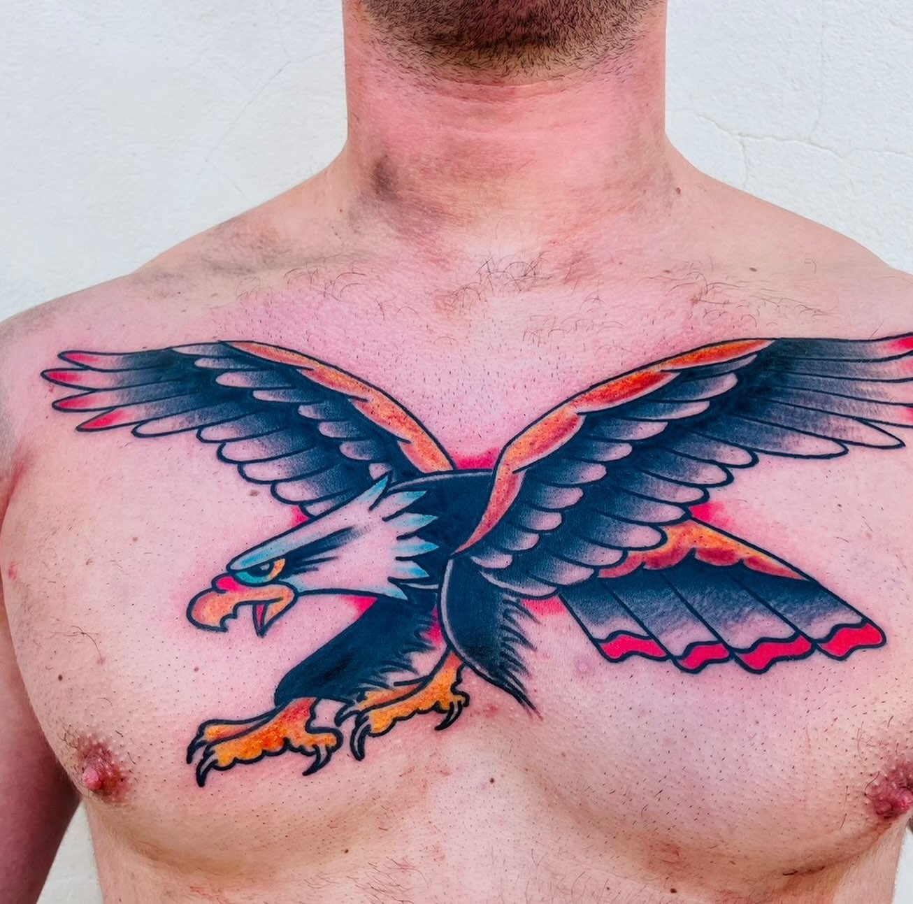 Eagle American traditional tattoo on the chest by dave rash