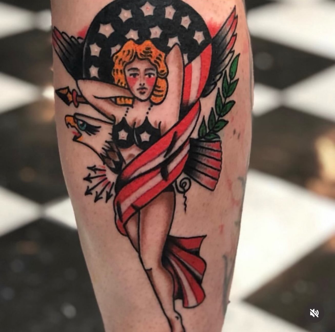 American pin-up girl American traditional tattoo on the forearm by dave rash