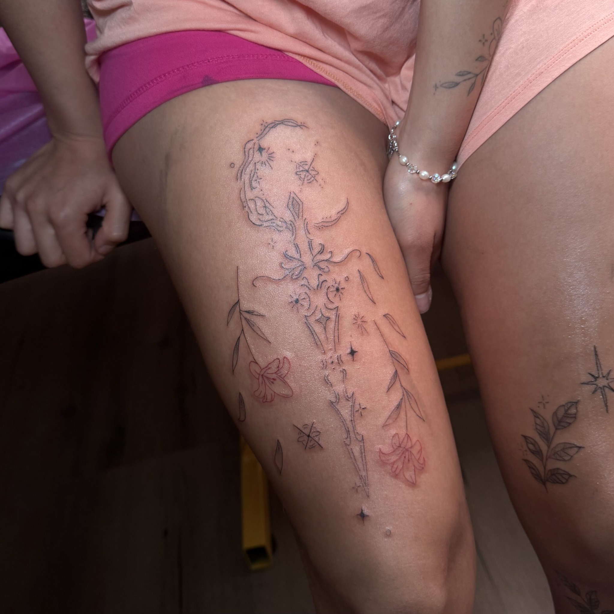 Floral bouquet fine line tattoo on the thigh by JJ ₍ᐢ._.ᐢ₎♡, Ashland, Virginia
