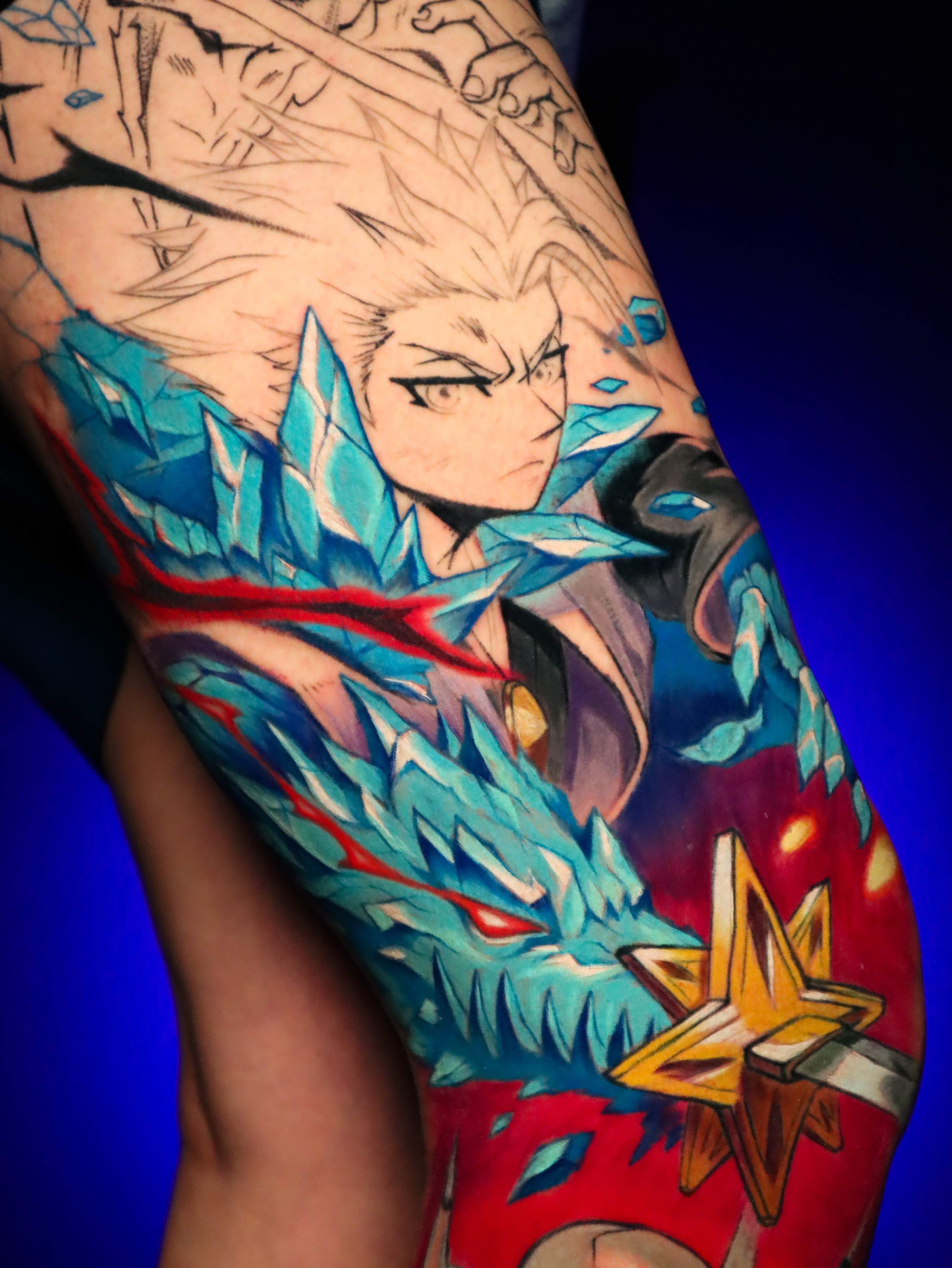 Anime character with dragon anime tattoo on the forearm by Jesús Blones - Tattoo Artist, Norwalk, Connecticut