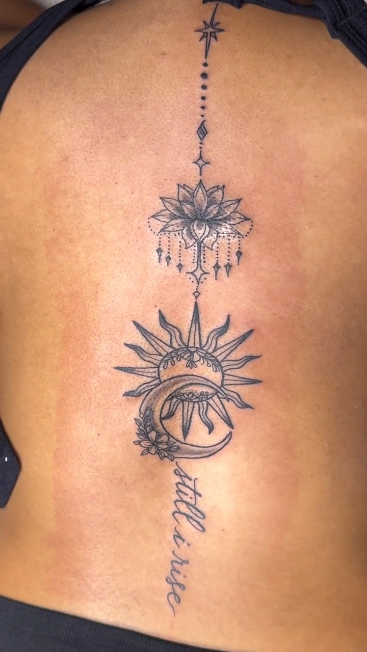 Ornamental tattoo on the back by Left My Mark