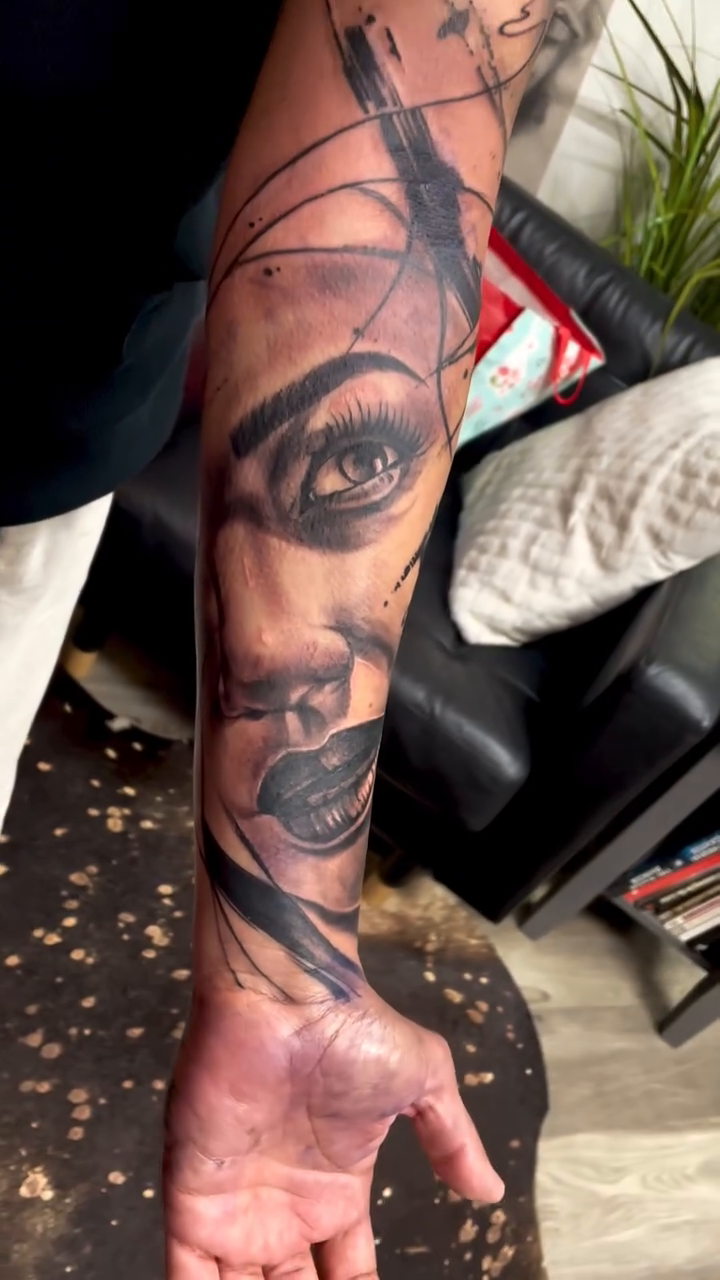 Portrait with abstract elements realism tattoo on the forearm by David Garner, Los Angeles, California