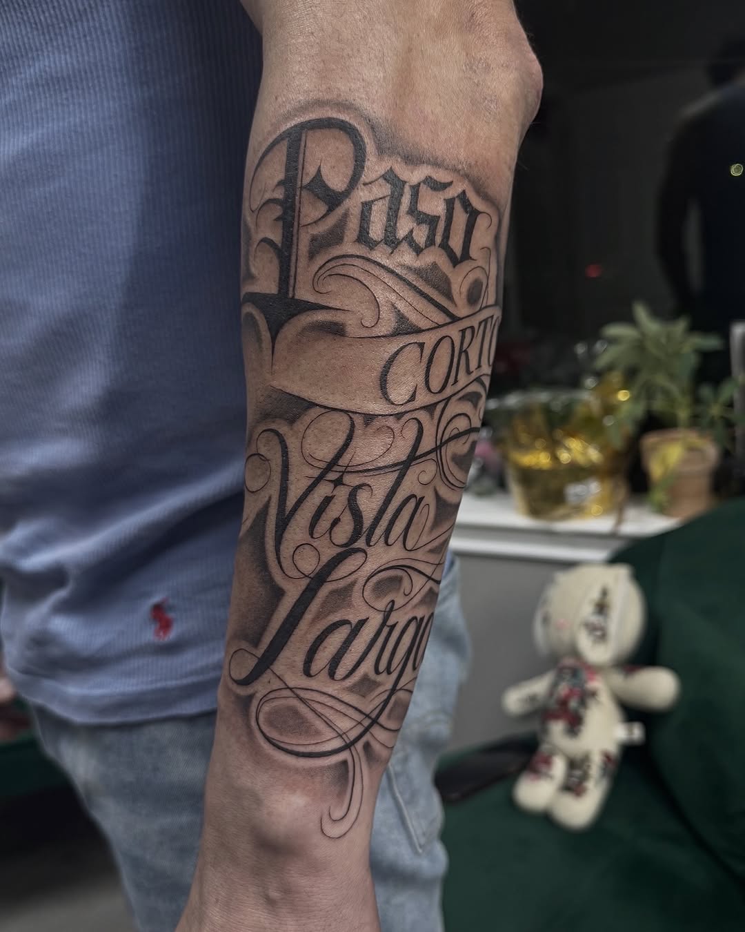 Tattoo by @modinerostattoos — lettering_script, chicano