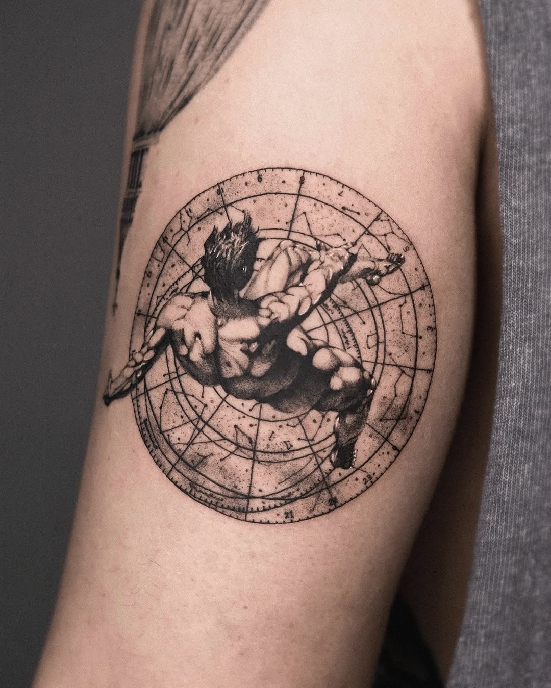 Man in astrological circle realism tattoo on the forearm by Seraph Geometry