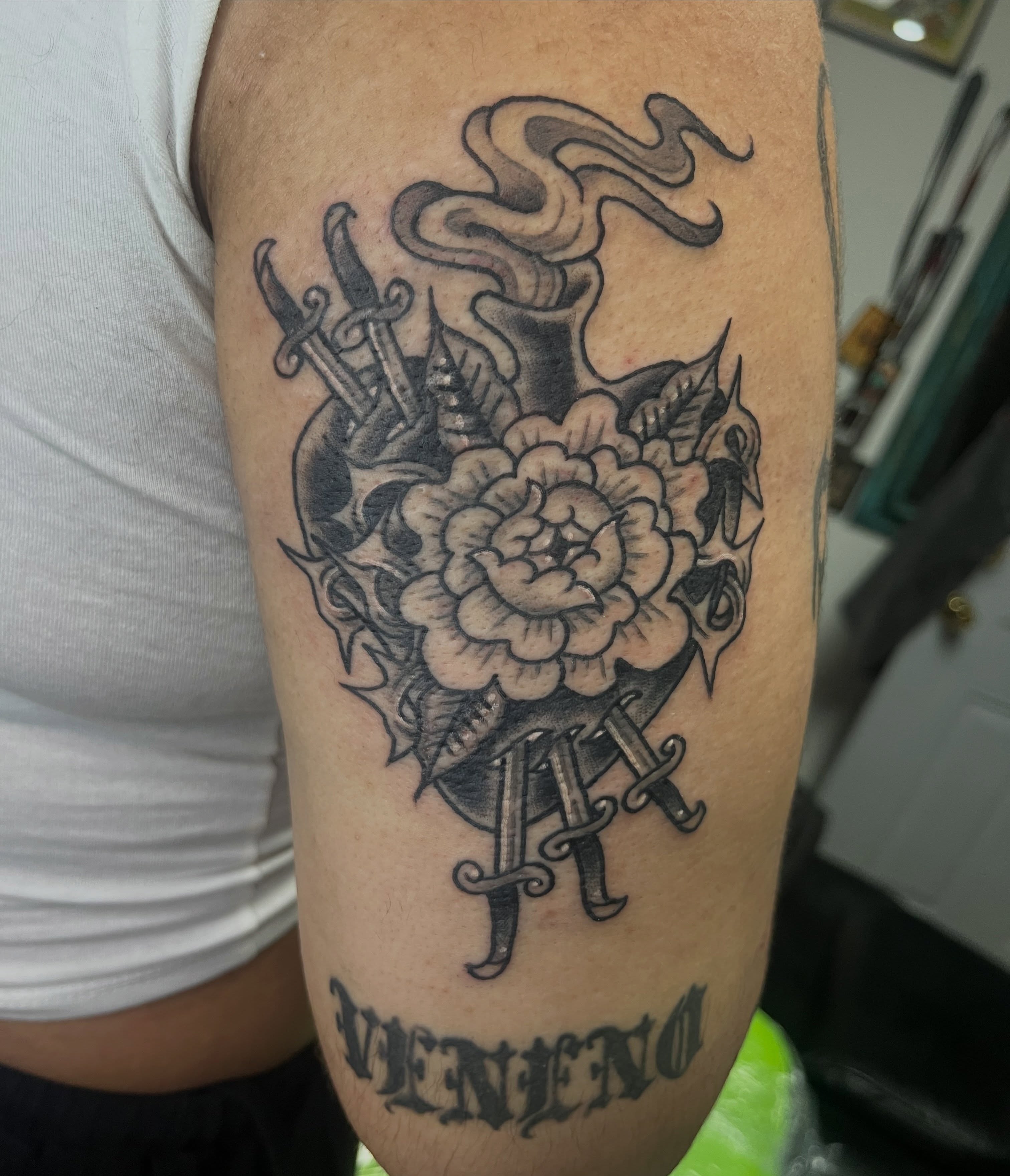 Peony and swords black and grey tattoo on the forearm by Tattoos and art by Ghost Shipe