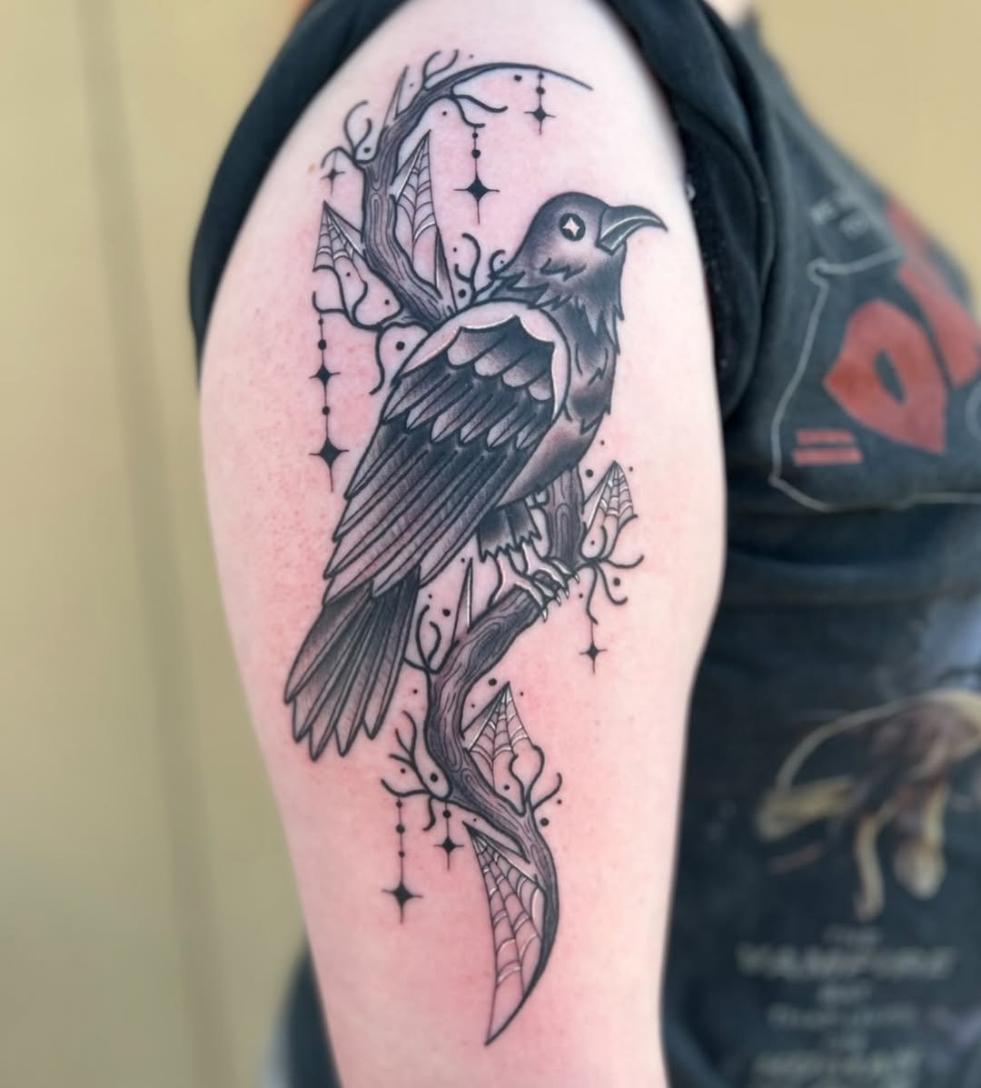 Raven on a branch with spiderwebs fine line tattoo on the shoulder by ๐ Michelle ๐