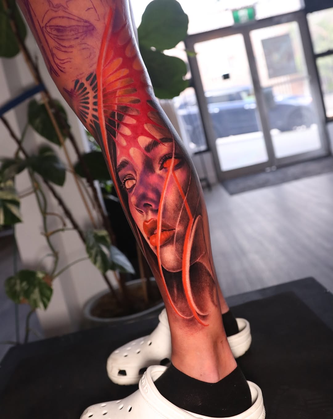 Surreal portrait with abstract elements surrealism tattoo on the forearm by Naomi Burke, New Westminster, British Columbia
