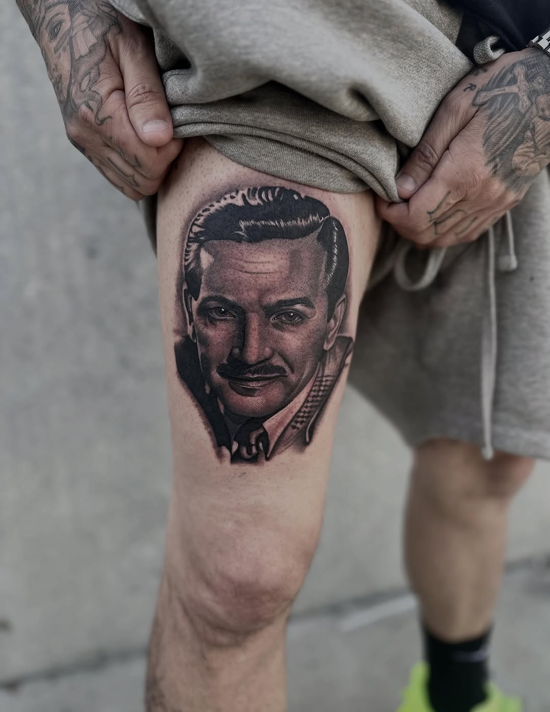 Portrait of a man realism tattoo on the thigh by Ruben