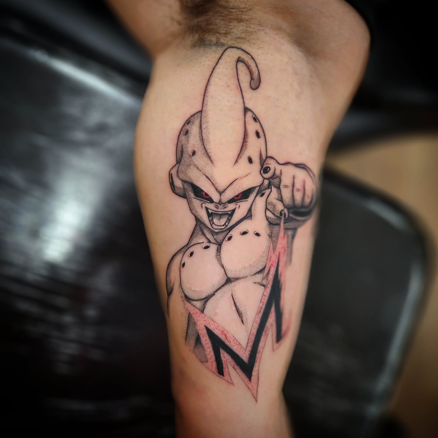 Peach dotwork tattoo on the thigh by Eric Richards