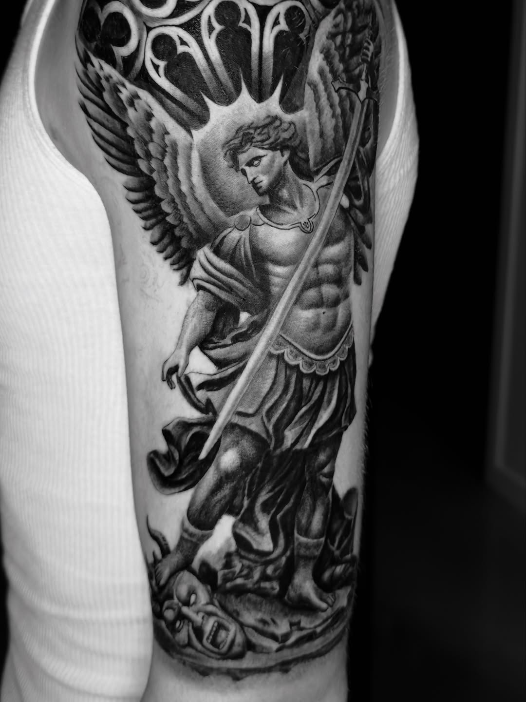 Archangel Michael realism tattoo on the forearm by Brandon Patino