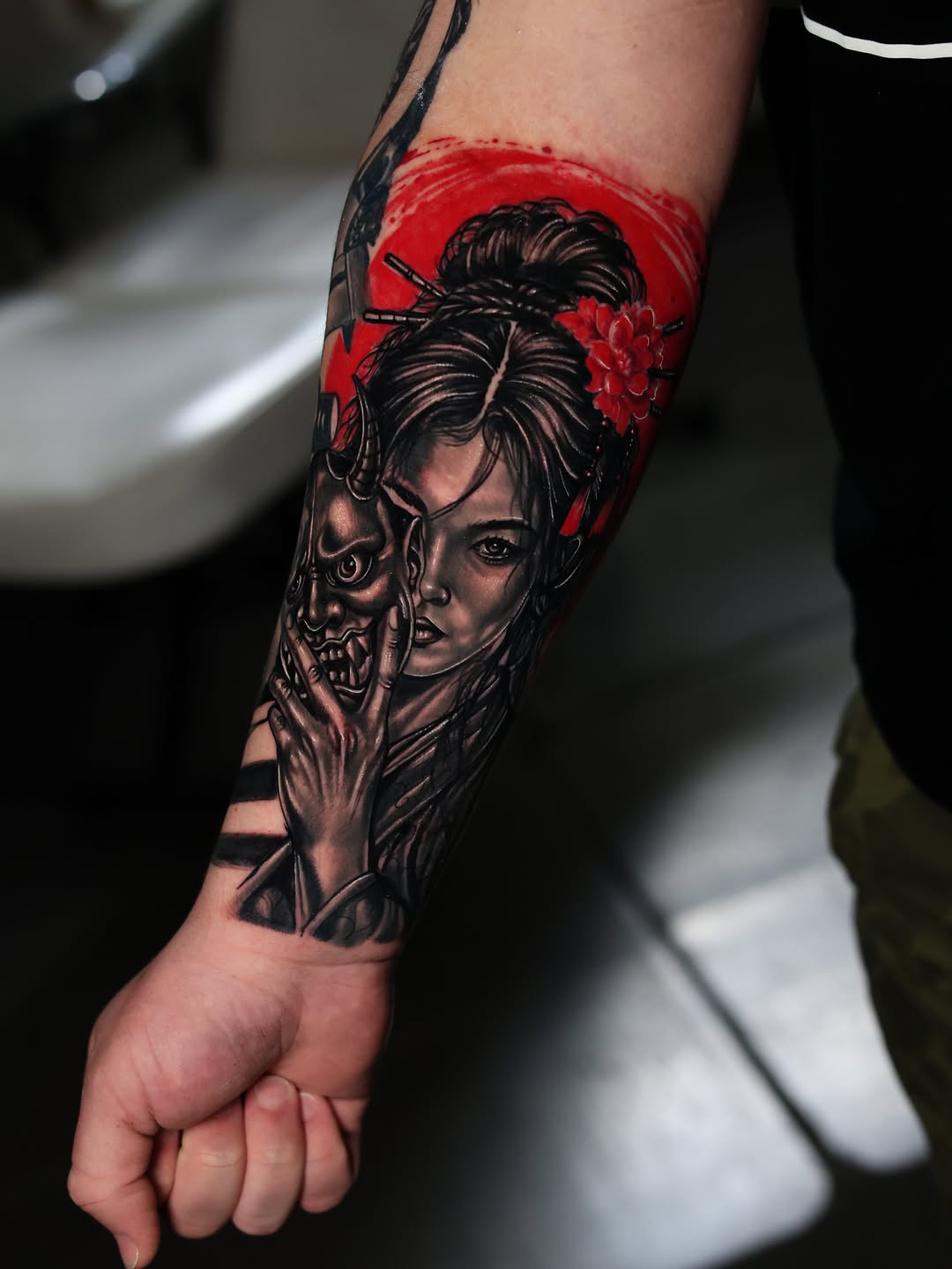 Geisha with mask Japanese tattoo on the forearm by Insight Ink Tattoo