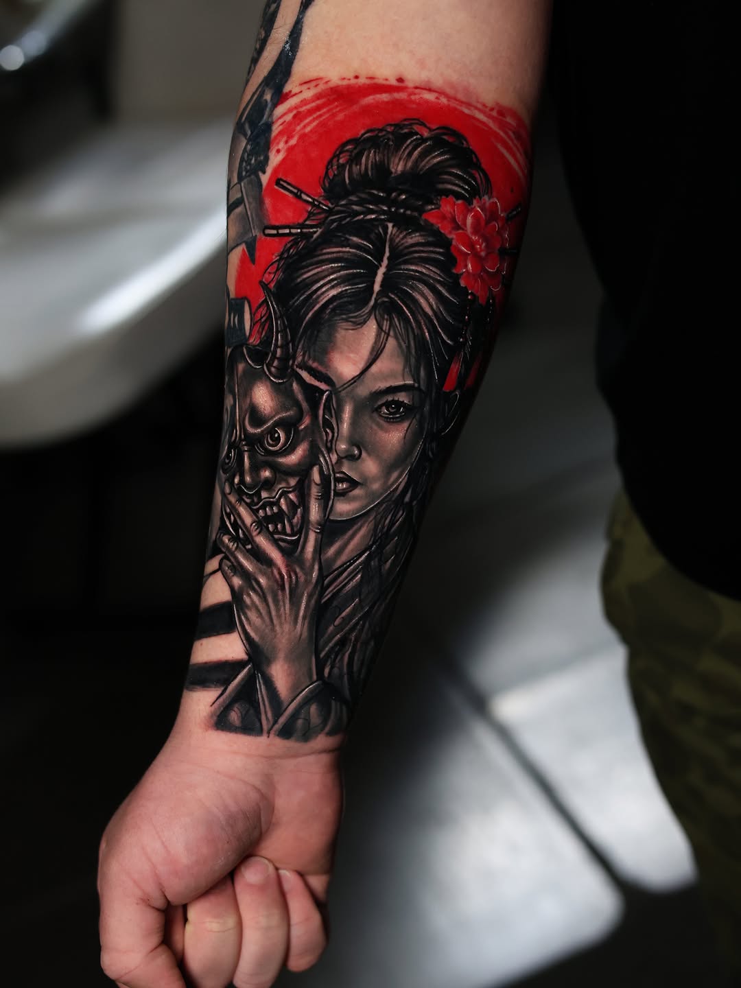 Geisha with oni mask Japanese tattoo on the forearm by Insight Ink Tattoo