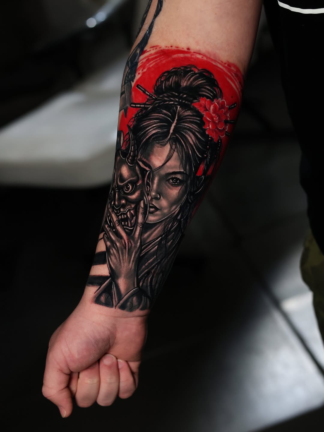 Geisha with oni mask Japanese tattoo on the forearm by Insight Ink Tattoo
