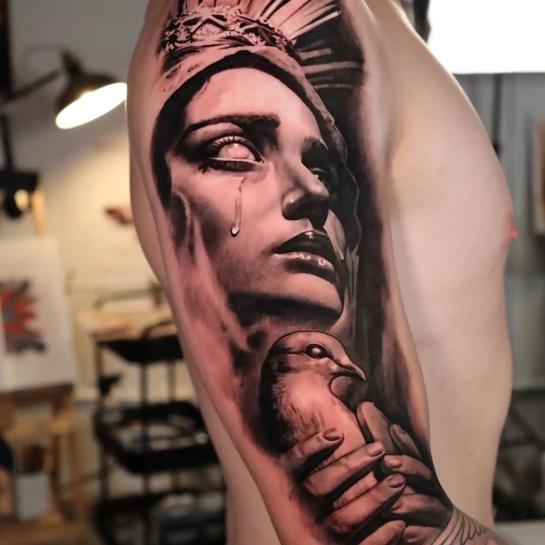 Woman and dove Chicano tattoo on the forearm by Miami Florida Tattoo Artist