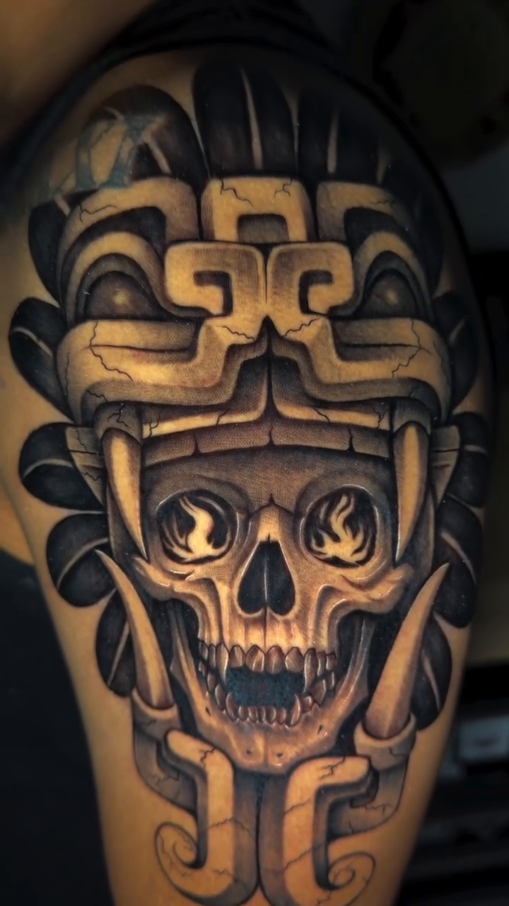 Aztec skull headdress realism tattoo by professional tattoo artist