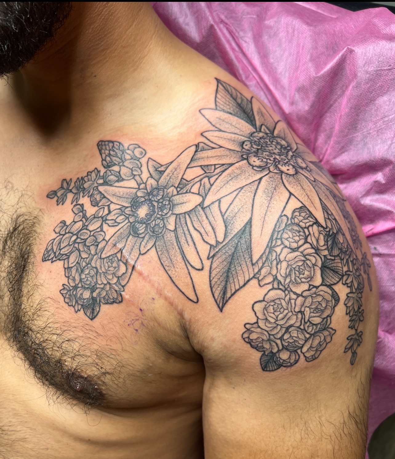 Floral bouquet black and grey tattoo on the shoulder by Bri Leflore