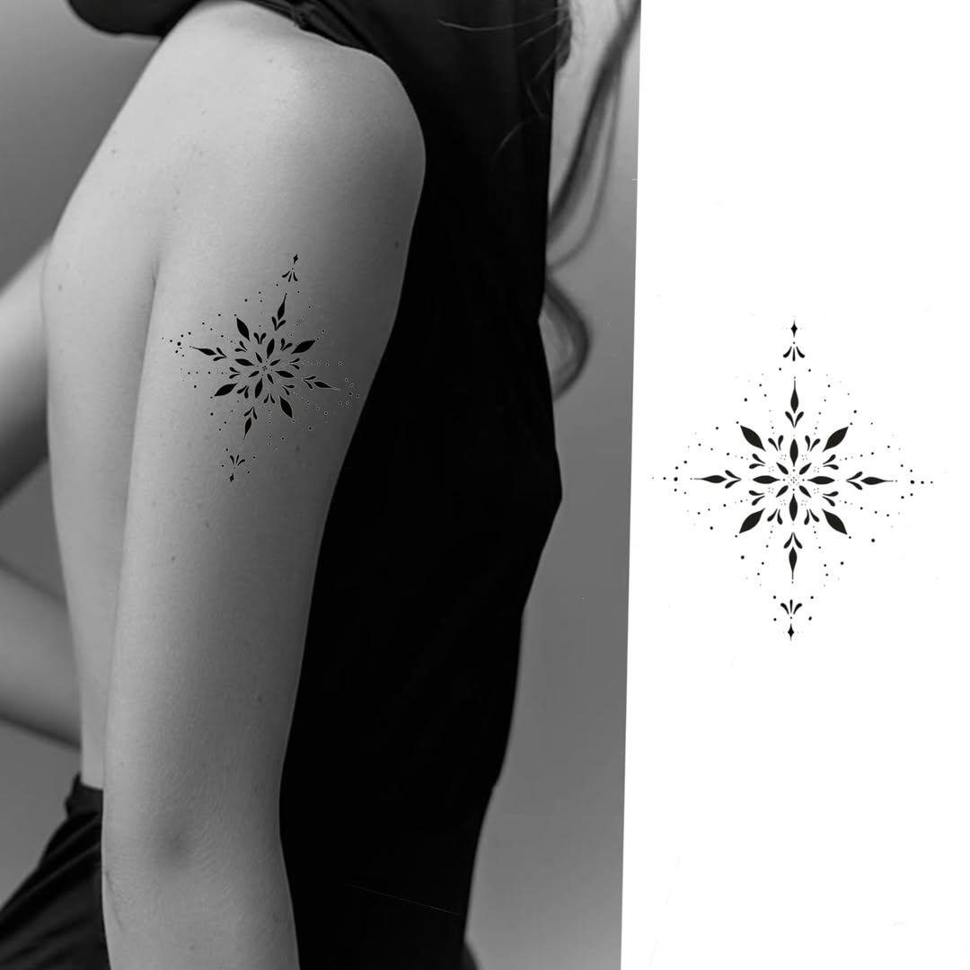 Geometric starburst ornamental tattoo on the shoulder by Joey tattoo