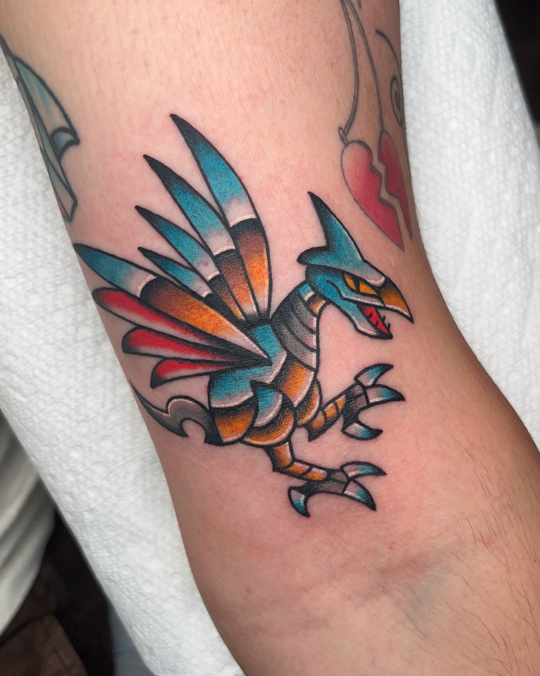 Dragon American traditional tattoo on the forearm by Nat Power