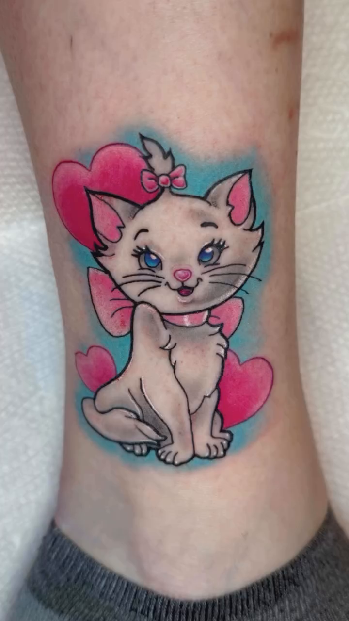 Marie the cat tattoo realism tattoo on the forearm by Erin Peterson