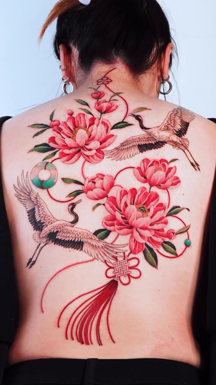 Peonies and cranes on a back neo-traditional tattoo on the back by Intat