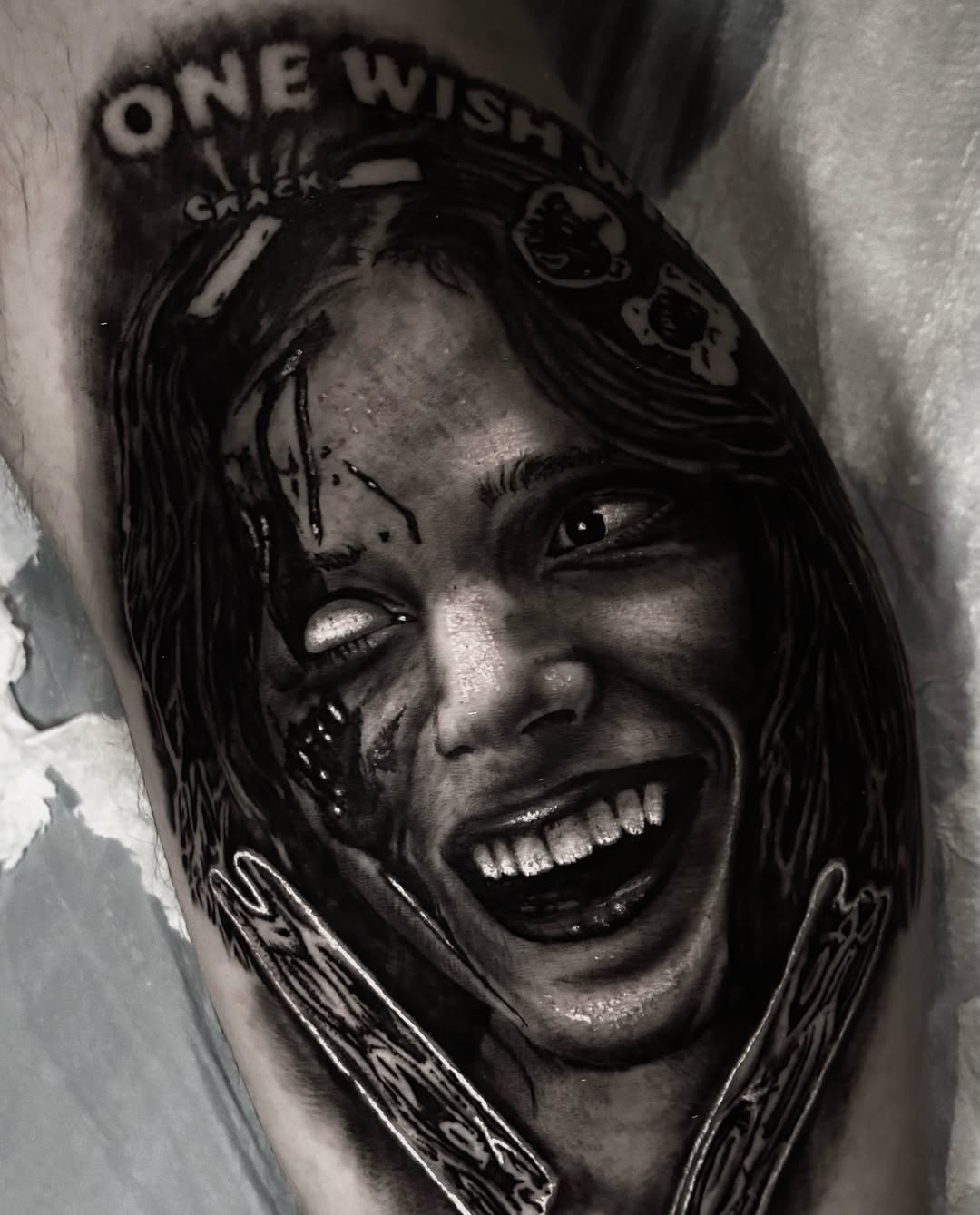 Woman black and grey tattoo on the forearm by Trev