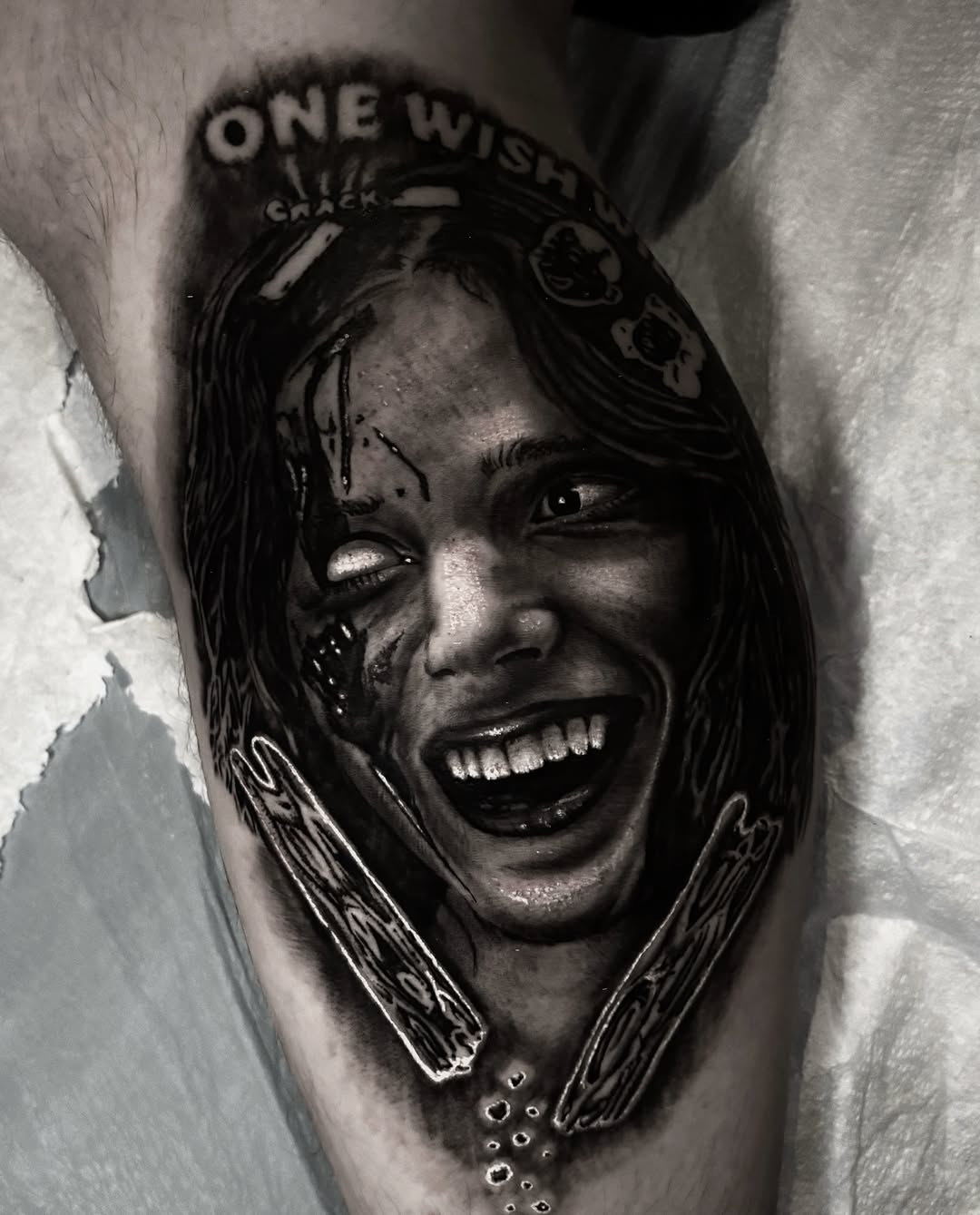 Woman laughing realism tattoo on the thigh by Trev