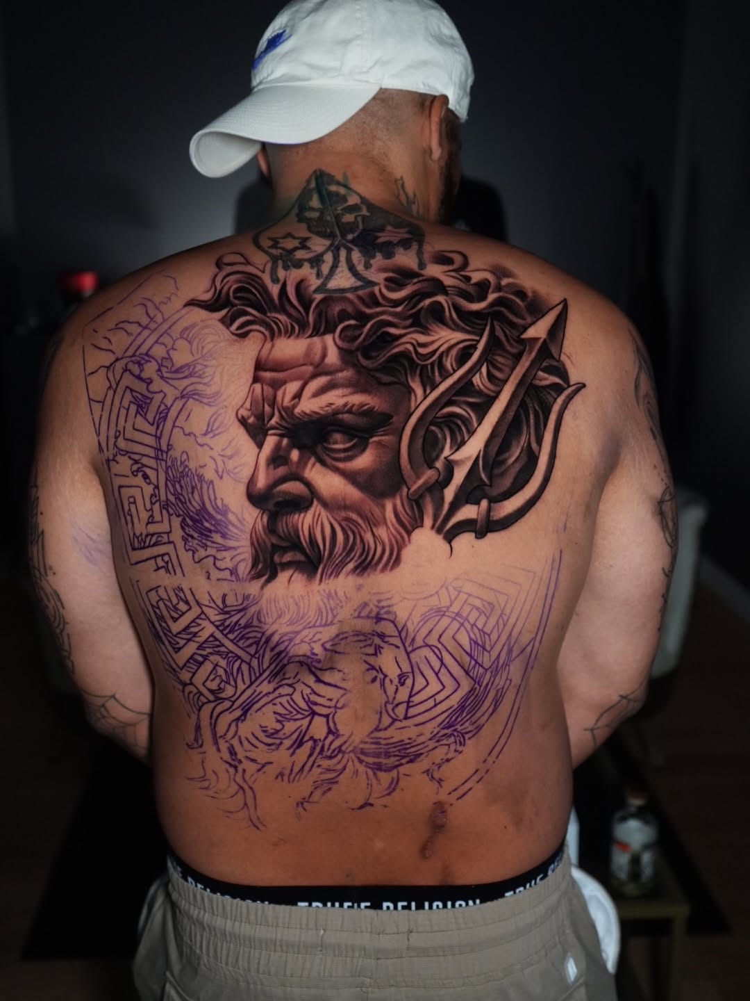 Neptune head with trident realism tattoo on the back by Robert Morton, Cleveland, Ohio