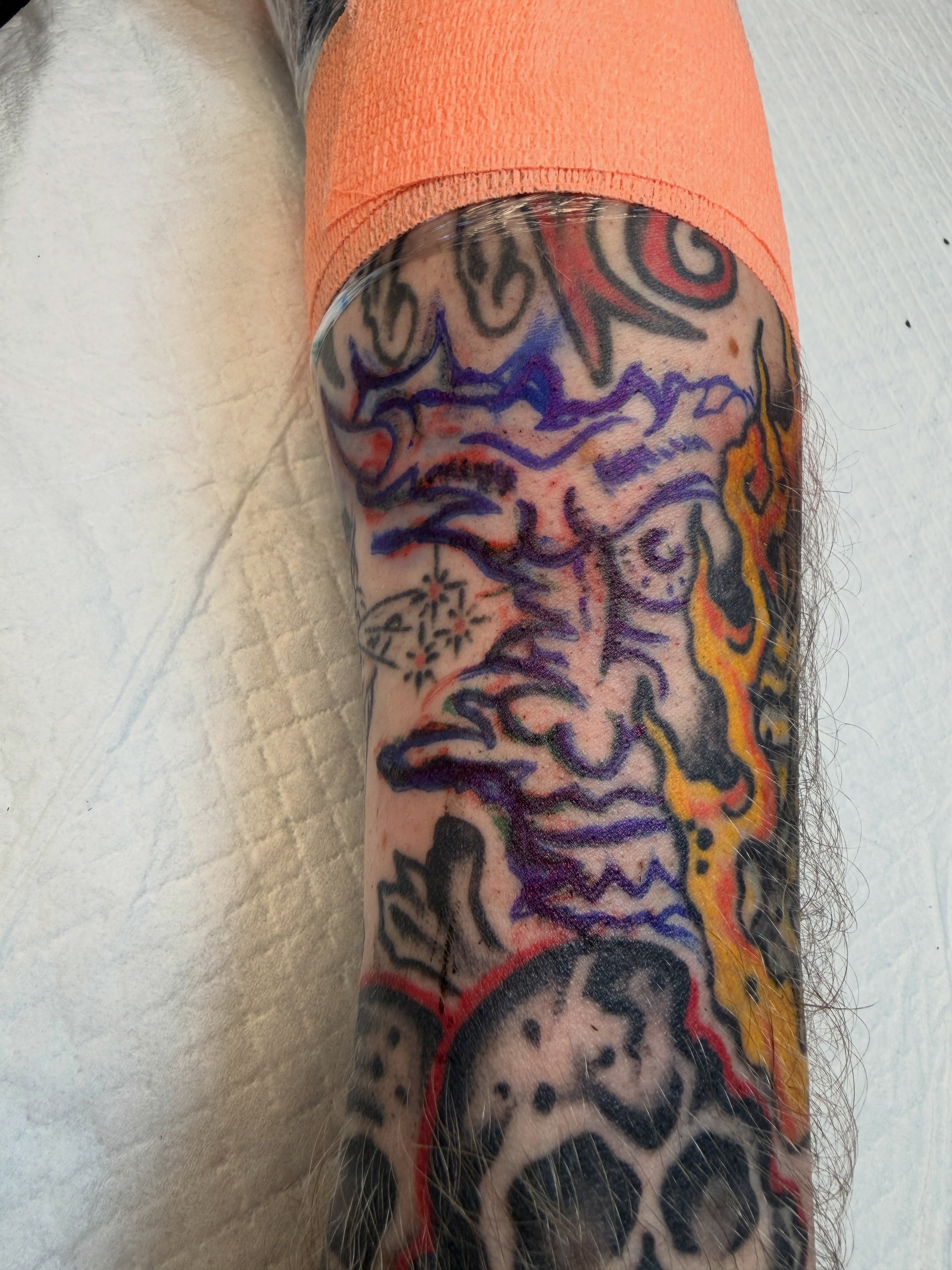Abstract design trash polka tattoo on the forearm by Joshua Speight