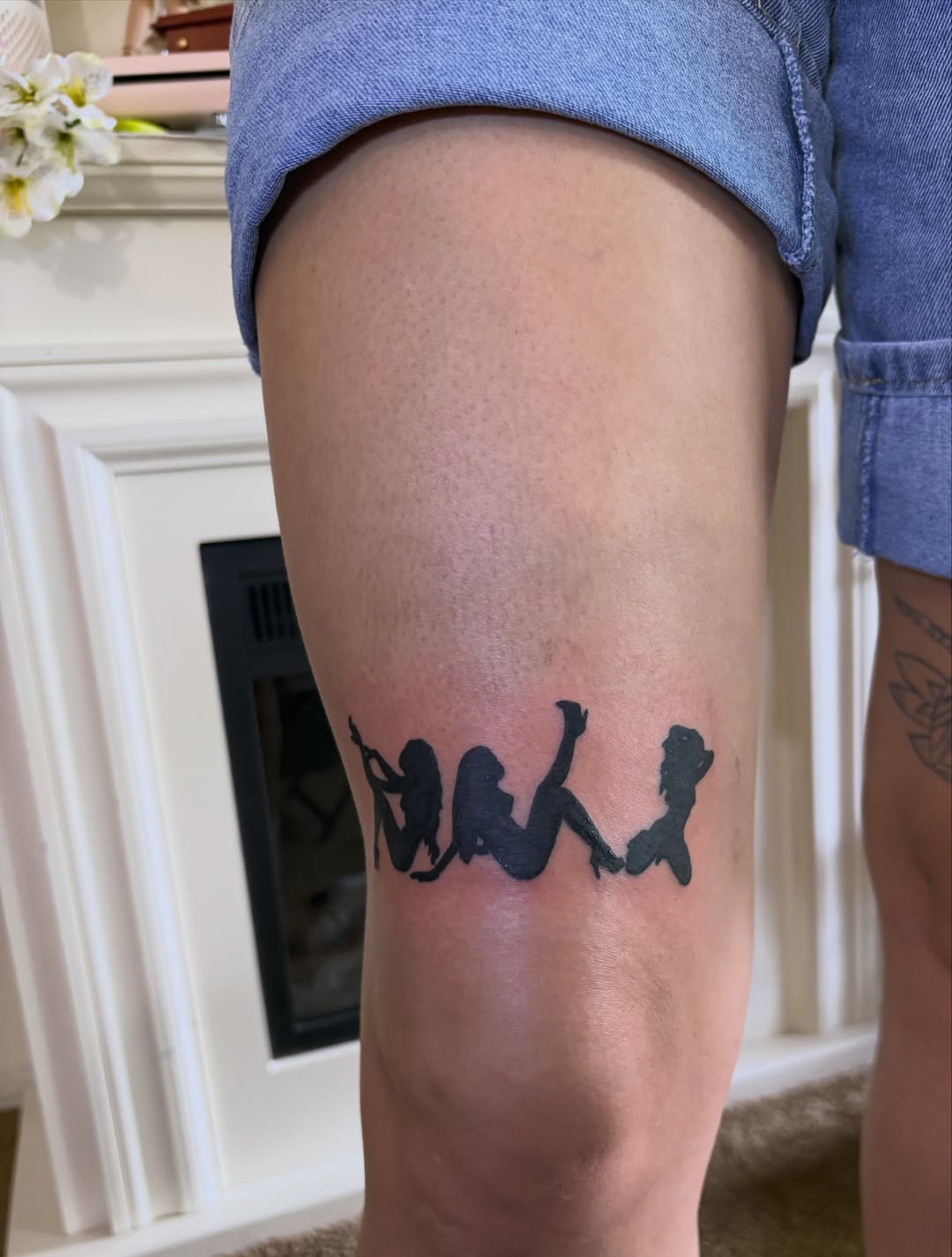 Silhouettes of three women minimalist tattoo on the thigh by winrytattoome