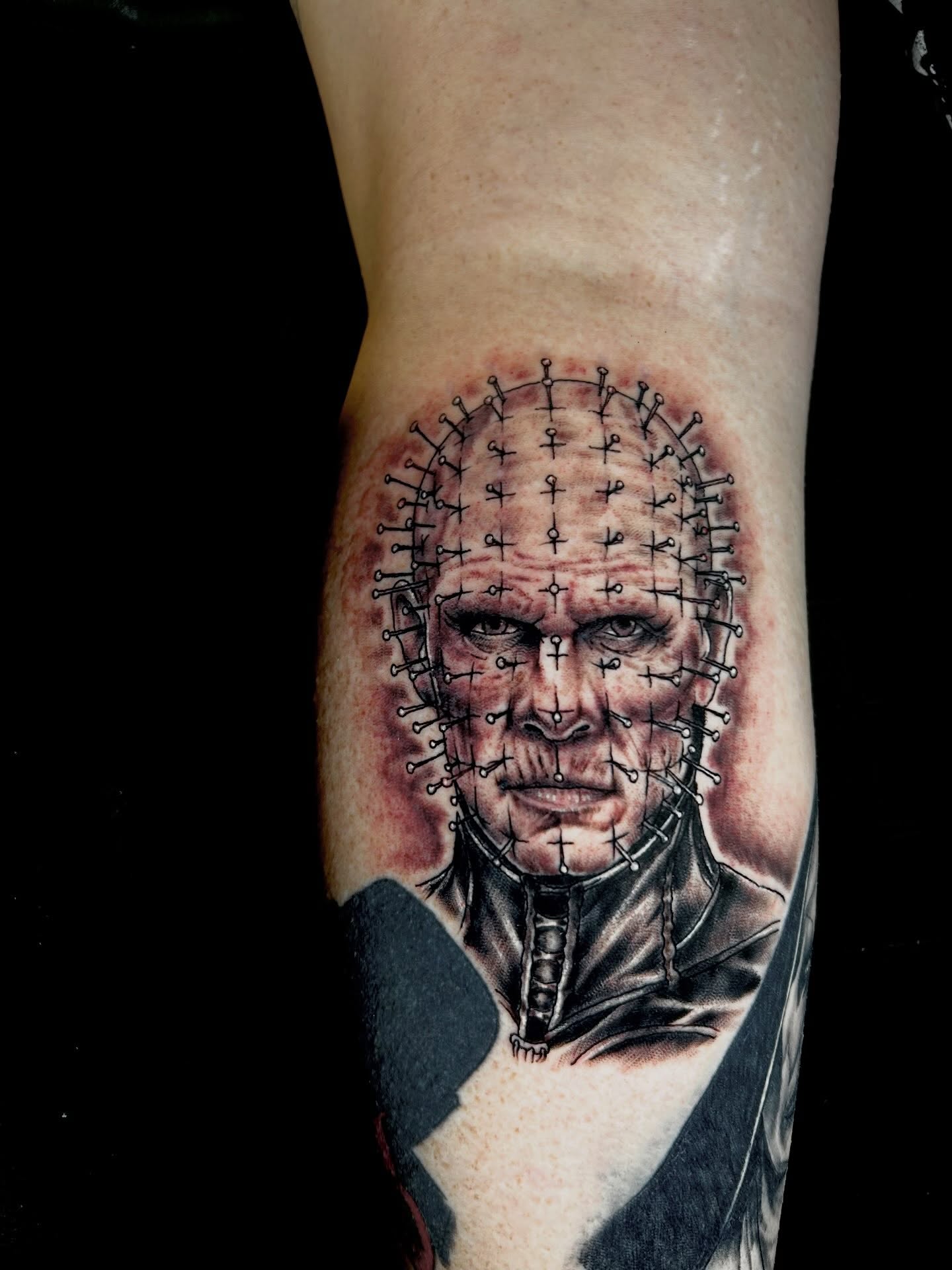 Pinhead dark realism tattoo on the forearm by Austin Young