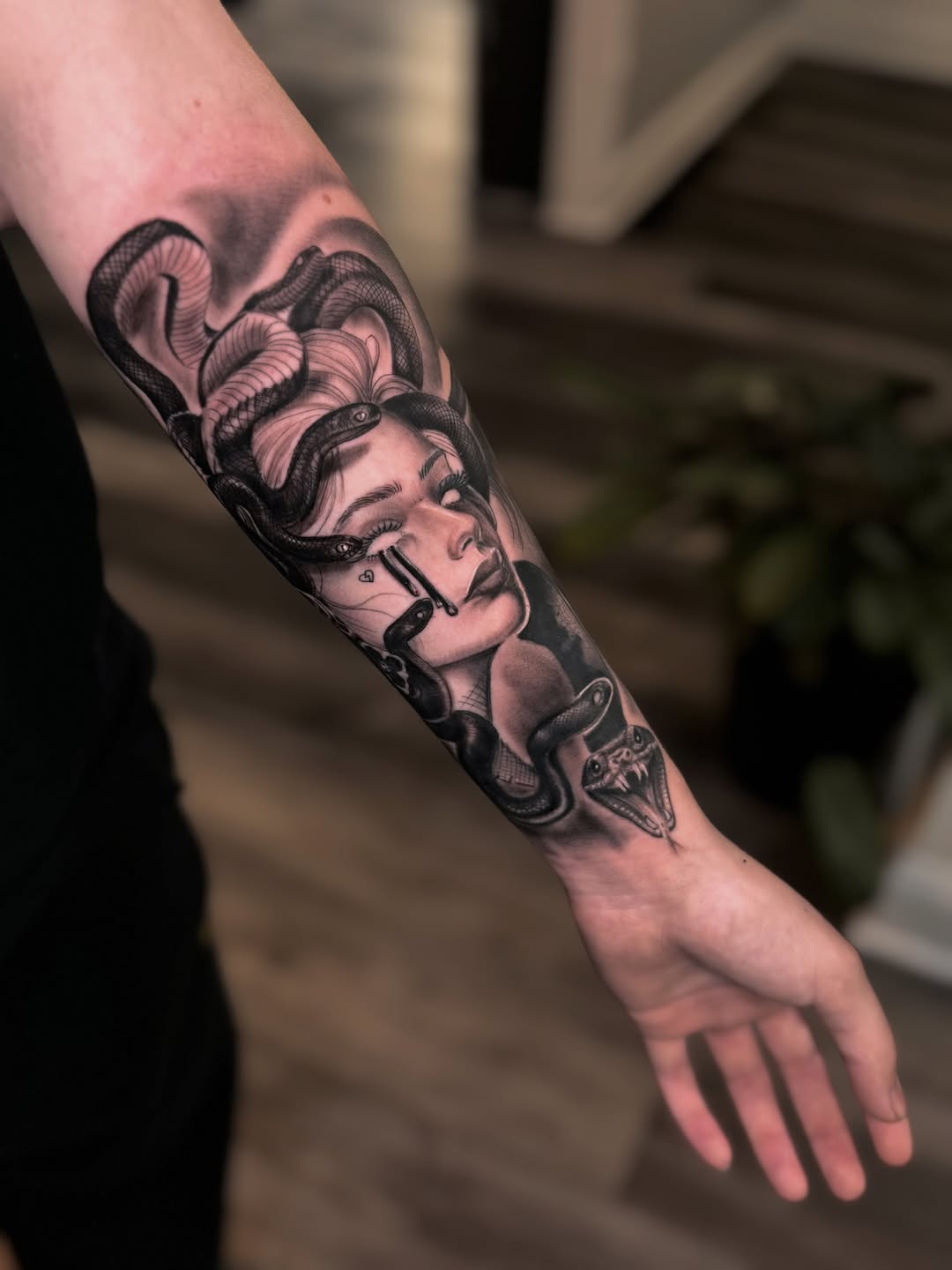 Medusa with snakes realism tattoo on the forearm by Miguel Garcia