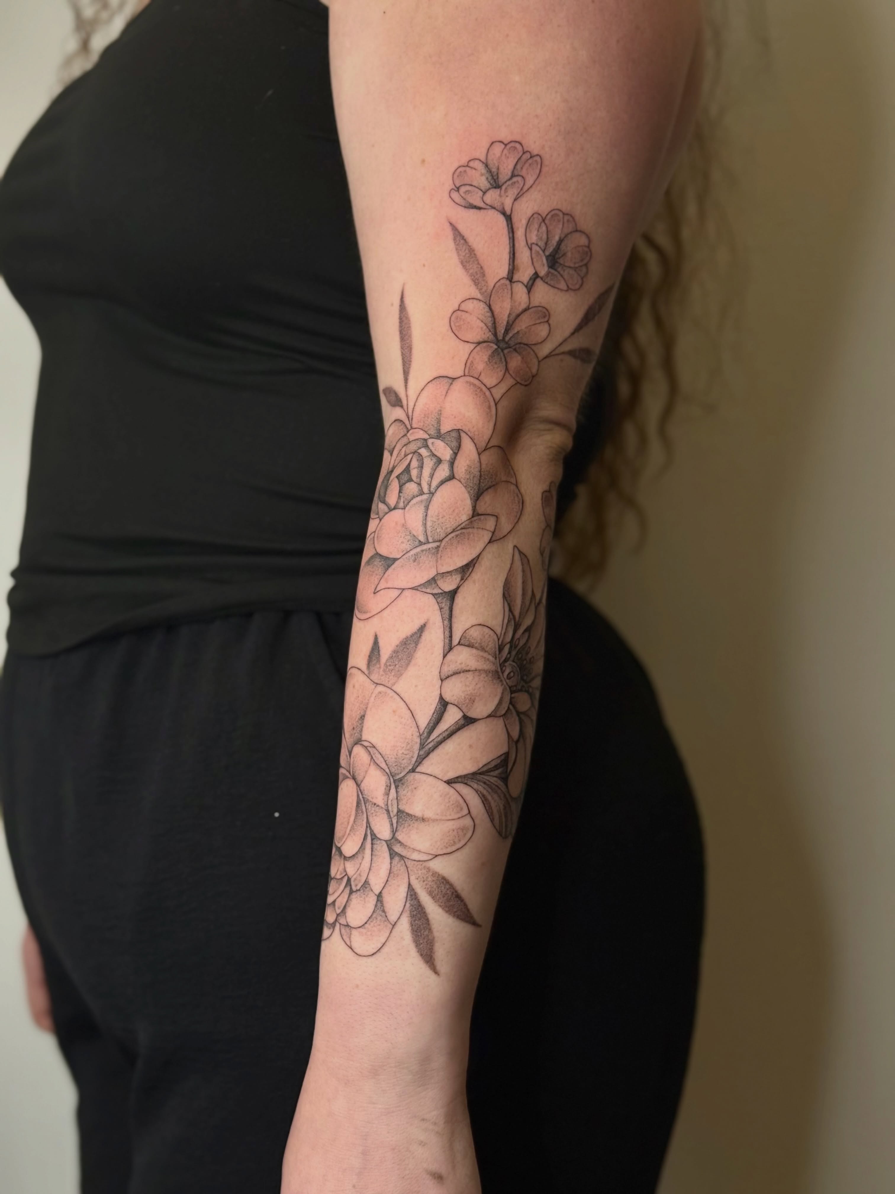 Flowers black and grey tattoo on the forearm by Emma Friesen - Lancaster & York Tattoo Artist, Lancaster, Pennsylvania