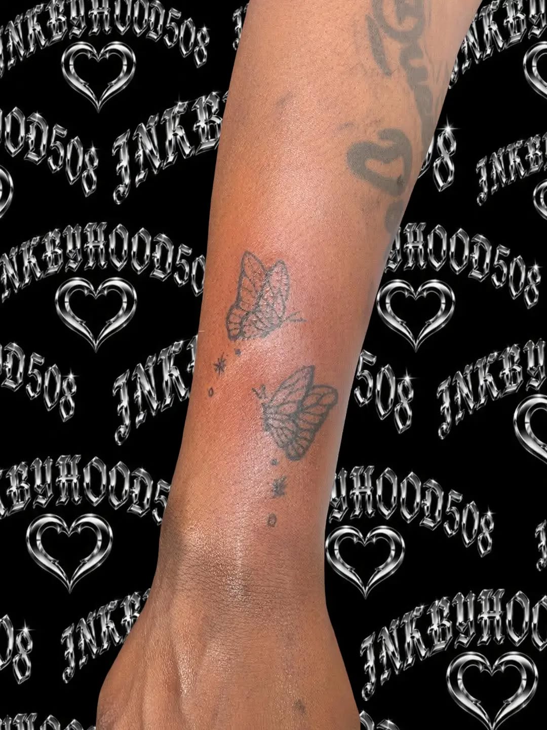 Two butterflies fine line tattoo on the forearm by Hood