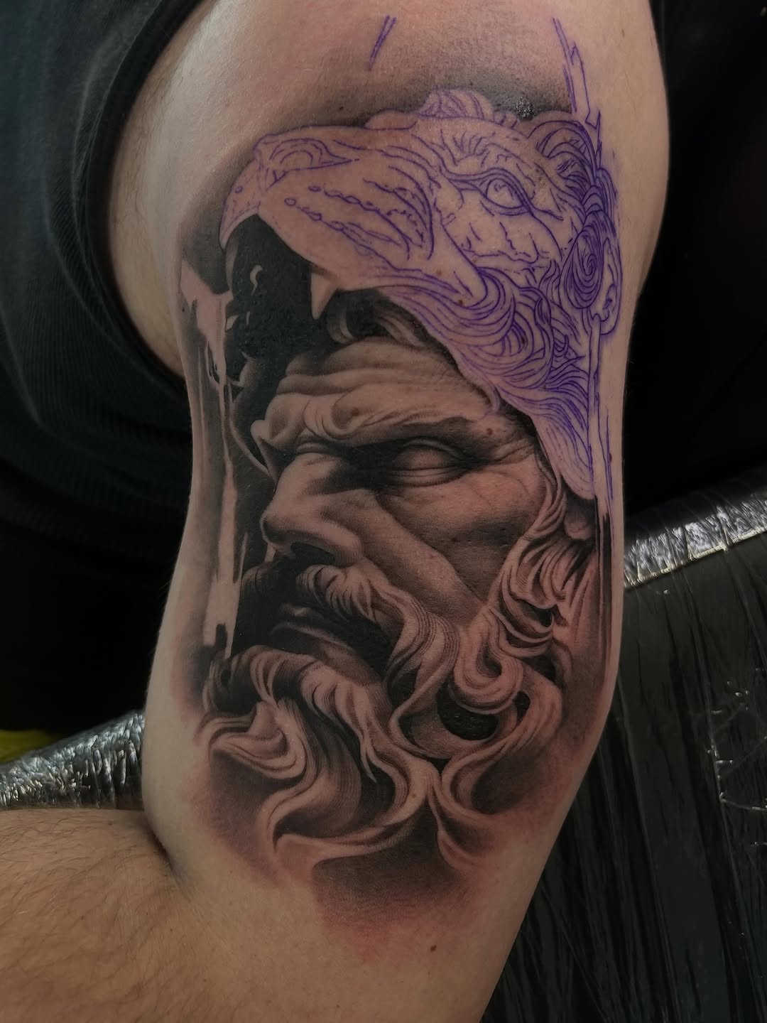 Surrealism tattoo on the shoulder by Dallas Corsmeier